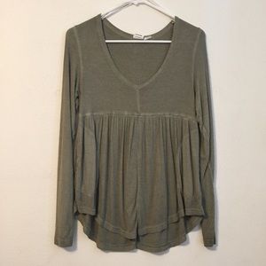 Green loose peplum style top